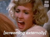 Sponsored gif. Actress Catherine Hicks as Karen Barclay from the movie Child’s Play screams in terror. In the upper right corner is the AMC Fear Fest logo. Text reads, “Screaming externally.”