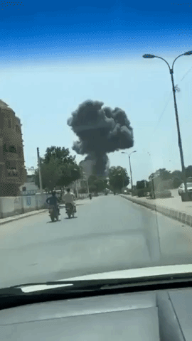 Black Smoke Billows Over Karachi Suburb After Passenger Plane Crashes