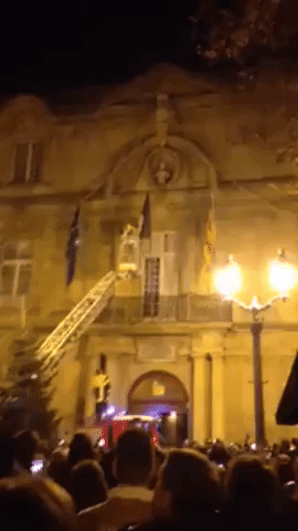 French Cities Furl National Flag Following Charlie Hebdo Shooting