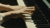 thefabelmans piano melody performing steven spielberg GIF