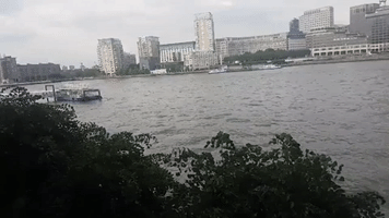 Police Boat Chases Jetskis on London's Thames River