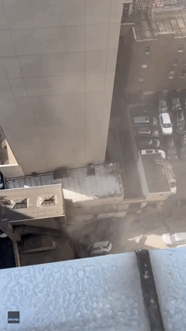 Aftermath of Deadly Parking Garage Collapse Filmed From Manhattan Building