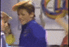Meme gif. Blonde boy Duane from Barbie Dance Club movie doing a Soul Train-like dance down a line of other kids. 