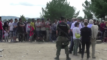Migrants Rush Macedonian-Greece Border in Search for Safety