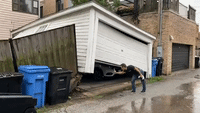 Tree Lifts Garage as It's Uprooted by Chicago Storm