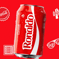 Sponsored gif. A red can of Coca-Cola with the name "Ronaldo" floats up into frame and then floats back down out of sight. Coca-Cola logos on bottle caps and sunglasses are in the background. 