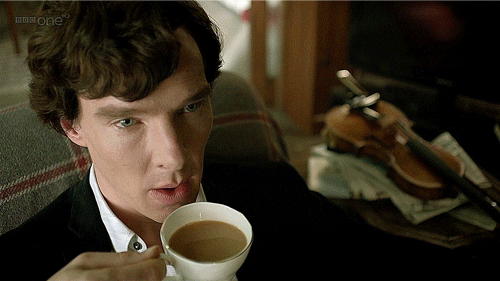 TV. gif. Benedict Cumberbatch as Sherlock Holmes gently blows on a small cup of tea.