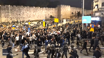 Police Charge Into Crowd During Palestinian Funeral Procession