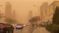 Thick Dust Storm in Beijing Turns Skies Orange