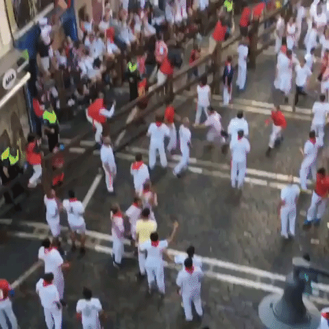 Crowd Runs Over Fallen Man at San Fermin Festival in Pamplona