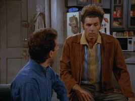 Seinfeld gif. Michael Richards as Kramer beckons to Jerry Seinfeld as Seinfeld to follow him before storming out the door. Text: "Let's go!"
