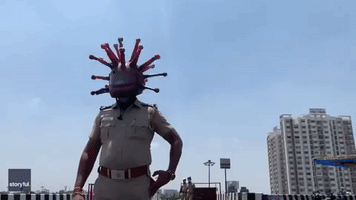 Police Inspector in India Patrols the Streets in Coronavirus-Themed Helmet