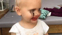 Little Girl Tries on Mom's Makeup Without Permission