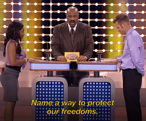TV gif. Two contestants face off in front of Steve Harvey on Family Feud. Steve Harvey says, “Name a way to protect our freedoms.” Both contestants slap the buzzer, the woman making it to the buzzer first. She says, “Defeat the aiders and traitors of the January 6 criminal conspiracy .” Steve Harvey points to the board where “Defeat aiders and traitors” pops up on the ranking as the number two answer.