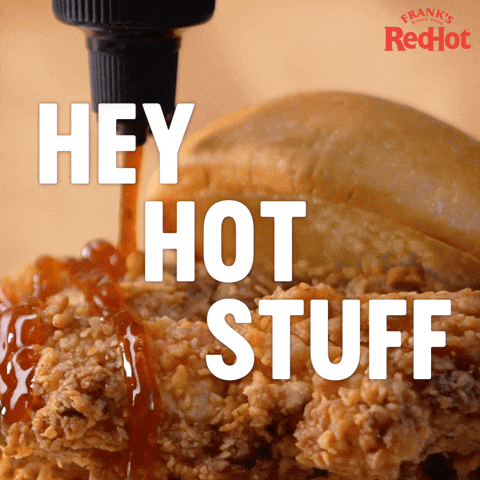 Sponsored gif. Frank’s RedHot sauce is slowly drizzled across crispy fried chicken. Text reads, “Hey hot stuff.”
