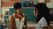 Movie gif. Abubakr Ali as Khal and Eva Reign as Kelsa in Anything's Possible. Kelsa tells Khal something uncomfortable and Khal replies by slowly saying, "That's... great," and looks away.