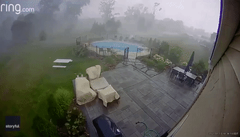 Furniture Sent Flying During Powerful Thunderstorm in New York