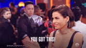 Reality TV gif. Jenna Dewan on World of Dance claps, smiles widely, and nods her head at someone. Text, “You got this!”