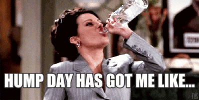 Celebrity gif. Resolute Megan Mullally chugs a bottle of water above the caption, “Hump day has got me like…”
