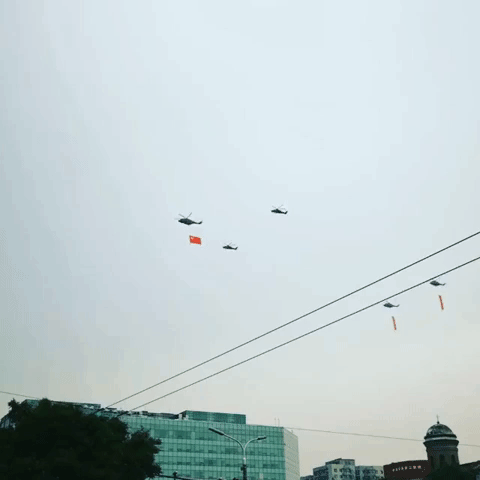 Helicopters Fly in '100' Formation as Beijing Celebrates Chinese Communist Party's Century Anniversary