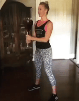 Woman Demonstrates the Perfect Wine Workout