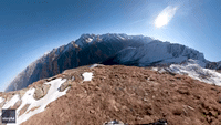 Daredevil Speed Flyer Races Down Mountain in Austrian Alps