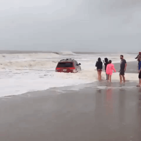 Water Surrounds Car Stuck on South Carolina Beach During Dorian Approach