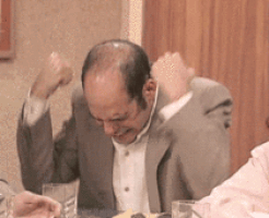 TV gif. David Cross on Mr. Show with Bob and David slams his fist against the table and rises up furiously, screaming, "No!" at the top of his lungs. His eyes appear reptilian with slivered pupils, and they stare menacingly at us.