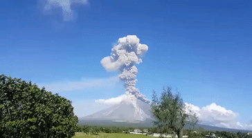 Sky Fills With Smoke as Mayon Volcano Emits Ash Column