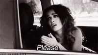Movie gif. A black-and-white scene of an exhausted-looking Salma Hayek inside a car, pleading out the window at us with her hands together. Text, 