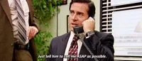 The Office gif. Steve Carell as Michael speaks into a phone. He gazes sternly ahead. Text, 