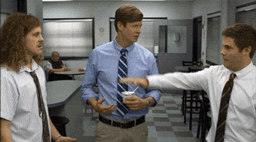 TV gif. The dudes from Workaholics, Blake Anderson, Adam Devine, and Anders Holm, put their hands together for a team cheer moment in the breakroom. Adam text: "Friendship!" Anders text: "Power!" Blake text: "Perseverance!"