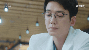 TV gif. Jung Kyung Ho as Kim Jun Wan in Hospital Playlist. He holds up a massive chicken drumstick and sighs while staring at it. It doesn't seem like he has an appetite and the text around the drumstick reads, "Yum. Yum."