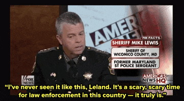 police officers news GIF