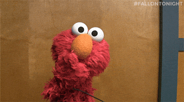 Sesame Street gif. Elmo blows us a kiss.