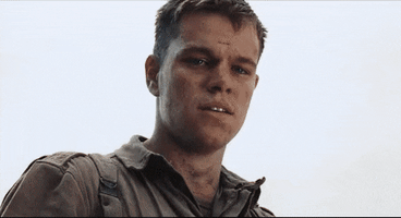 Movie gif. Matt Damon as Private Ryan in Saving Private Ryan dressed in military uniform with eyes holding back tears. His face slowly changes to an old man with white gray hair and teary eyes. 