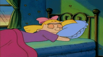 Cartoon gif. Helga from Hey Arnold! She's laying face down on a bed with her arms under the pillow and blinks sleepily, her unibrow and eyes moving in unison.
