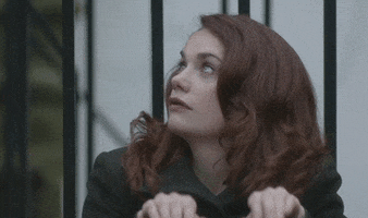 TV gif. Ruth Wilson as Alice in Luther stares as she makes a sexual gesture with her hands, making a hole with her finger and thumb, then pumping her index finger in and out.