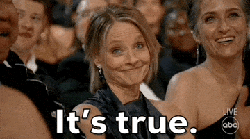 Celebrity gif. Jodie Foster sits in the audience at the Academy Awards. She smiles and nods her head enthusiastically as she says, “It’s true.”