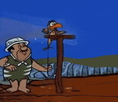 Flintstones gif. Caveman foreman pulls a prehistoric work whistle, a string attached to a bird whose beak opens wide and yells, “Take a break and go vote.” Fred Flintstone smiles and waves his arms in celebration and says, “Yabadabadoo!” as he hurries away.