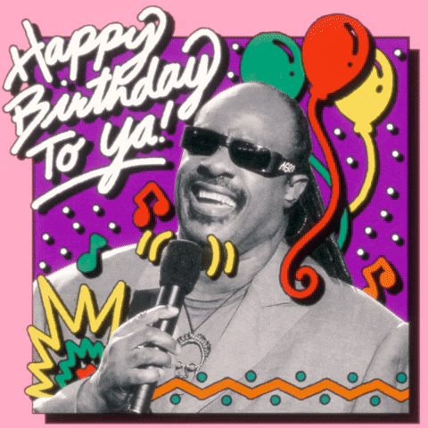 Digital compilation gif. Black and white photo of Stevie Wonder singing into a microphone as animated colorful graphics like balloons, musical notes, and confetti flash around him. Text, "Happy Birthday to ya!'
