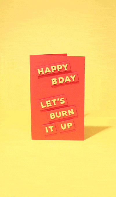 Digital art gif. Birthday card slowly burns to the ground. Text on the front of the card reads, "Happy B Day. Let's burn it up."