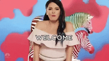 SNL gif. Cecily Strong dances, swaying side to side, with rainbow zebras in the background. Stars spin behind Kate McKinnon as she dances with her arms out. They both sing, “Welcome to Hell.”