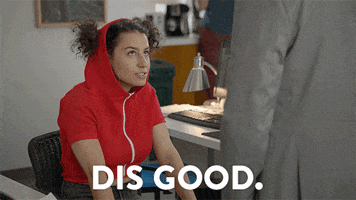 TV gif. Ilana Glazer as Ilana on Broad City. She's wearing a hoodie that's been modified to accomodate her hair buns and she nods enthusiastically, saying, "Dis good. Dis real good." 