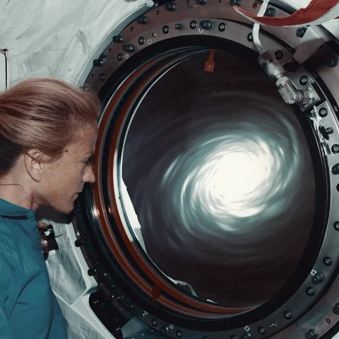space woman watch nasa universe GIF