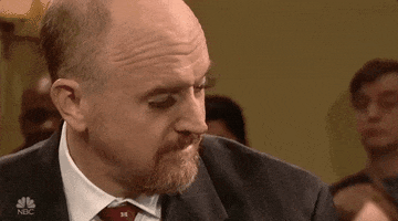 blinking louis ck GIF by Saturday Night Live