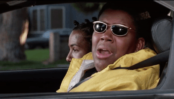 Movie gif. Kenan Thompson as Dexter in Good Burger 2 sitting in a car wearing sunglasses and a yellow jacket. He opens his mouth wide and cries, "Whyyyy!"