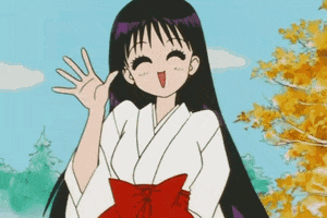 Anime gif. Sailor Mars from Sailor Moon cutely waves to us with a bright smile spread across her face and her eyes crinkling into crescent moons.