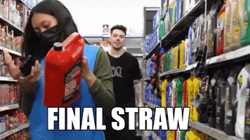 Video gif. A young man walks down a grocery store isle and tilts his head as if annoyed. Text, "Final straw."