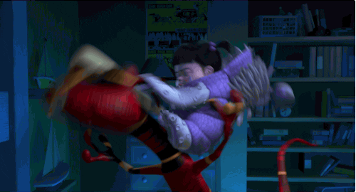 Disney gif. Boo in Monsters, Inc. jumps on a monster, hitting him with a baseball bat. Every time she hits him, he changes colors.